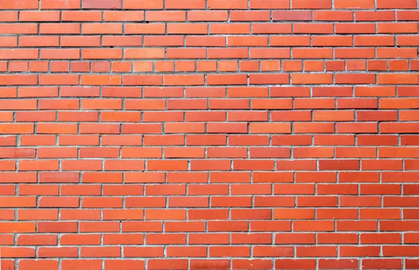 La textura de la pared de ladrillo es marrón — Foto de Stock