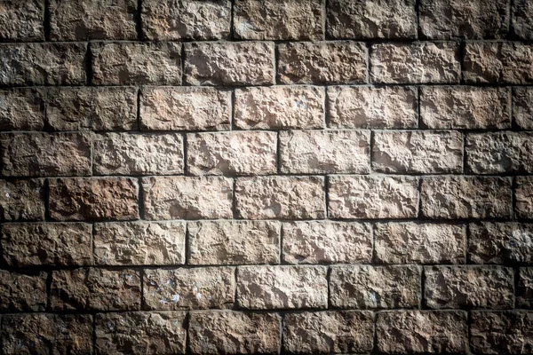 Фон каменной стены с виньетированием — стоковое фото