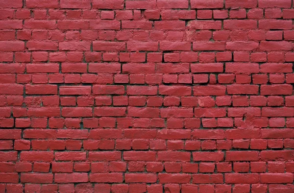 Struktur på en röd tegelvägg — Stockfoto