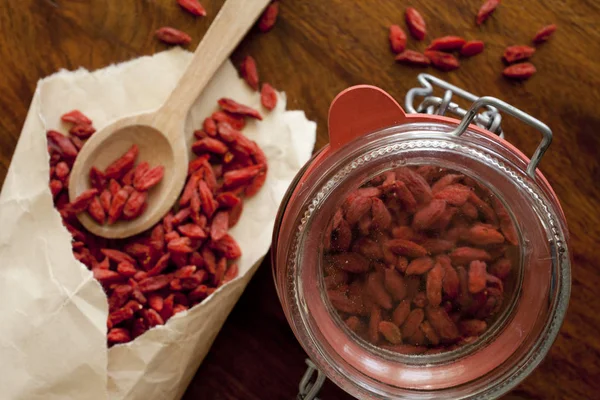Goji berries on the wooden table — Stock Photo, Image