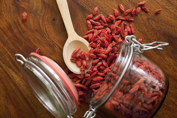 Goji berries on the wooden table — Stock Photo, Image