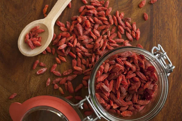 Goji berries on the wooden table — Stock Photo, Image