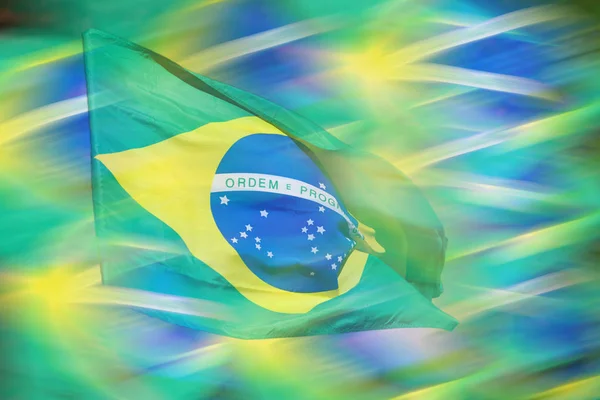挥舞着巴西国旗为背景 — 图库照片
