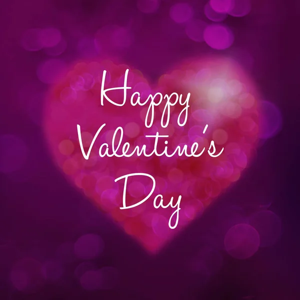 Valentine\'s day heart with sparkling bokeh effect and inscription