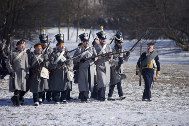 WARSAW, POLAND, Februar 24: Reenactors during annual reenactment of the Battle of Olszynka Grochowska 1831- a battle between Poland and Russia- on February 24, 2018 in Warsaw, Poland. clipart
