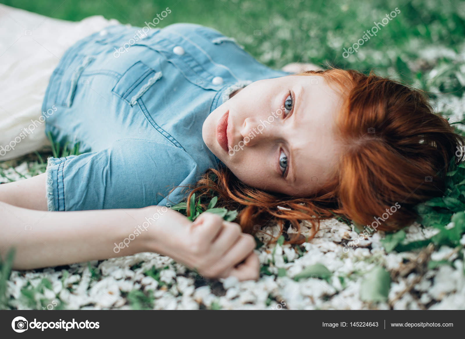 Girl lying on field Stock Photo by ©showpx 145224643
