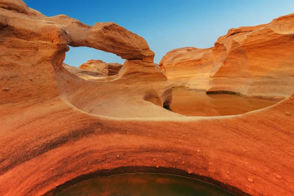 Rocks hit the sun and river — Stock Photo, Image