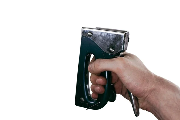Промисловий степлер в руці ізольований на білому тлі Ліцензійні Стокові Фото