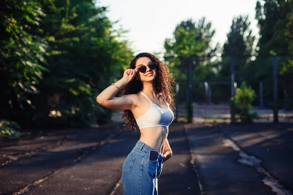 Young Brunette Glasses Long Curly Hair Standing Street White Top — Stock Photo, Image