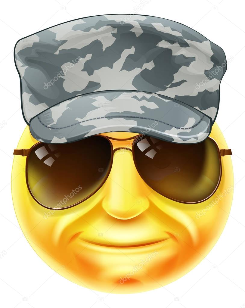 A soldier emoji emoticon smiley face character wearing a camouflaged cap and sunglasses