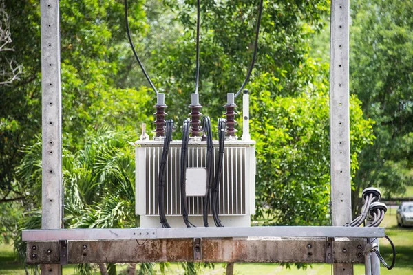 high voltage electricity transformer on cement bar