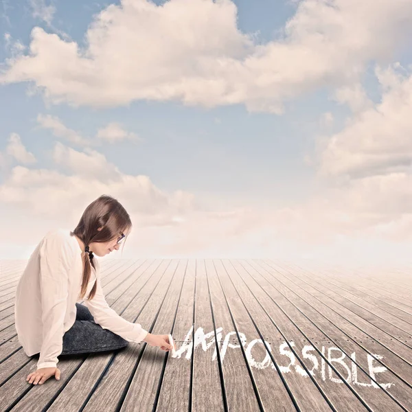 Young girl writting with chalk — Stock Photo, Image