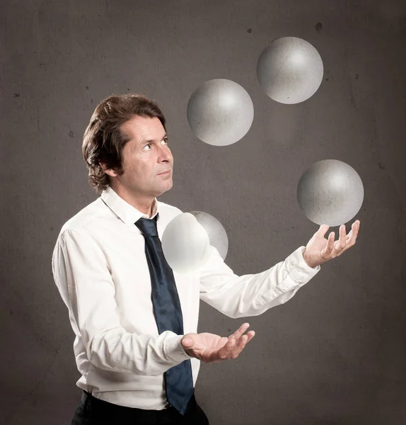 Businessman Juggling Crystal Sphere Balls — Stock Photo, Image