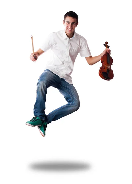 Young man jumping with violin — Stock Photo, Image