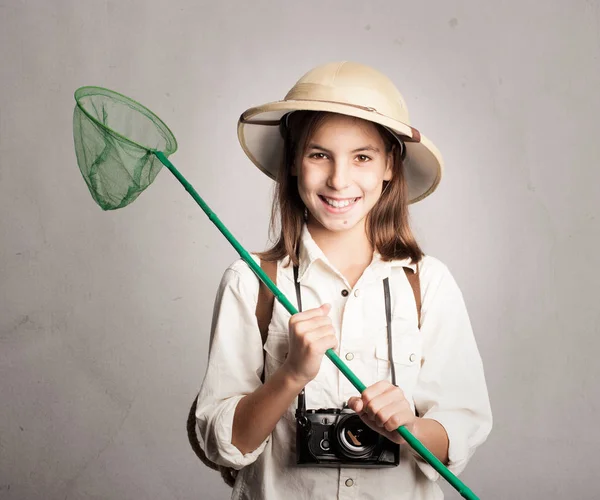 Little explorer holding a butterfly net — Stock Photo, Image