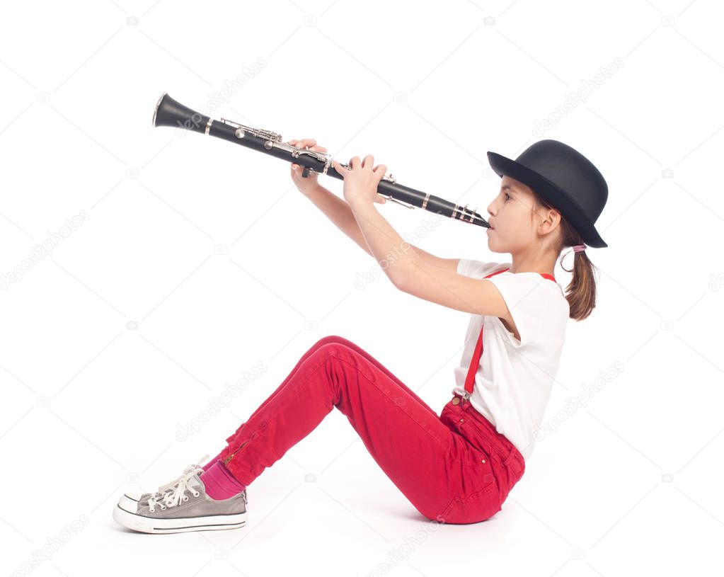 little girl playing clarinet