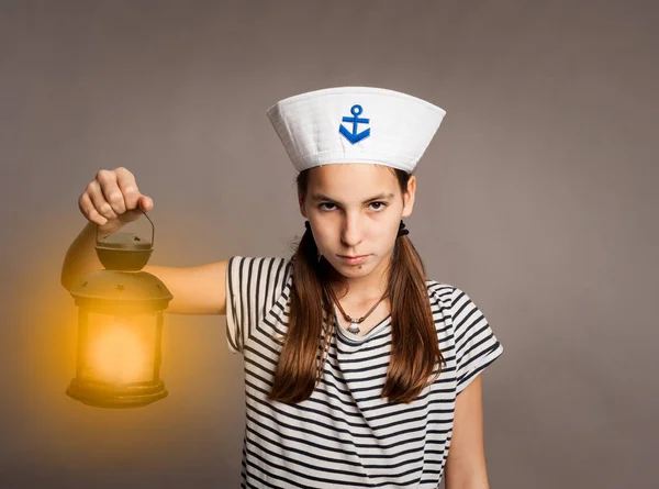 Little Marine Holding Lantern Gray Background — Stock Photo, Image