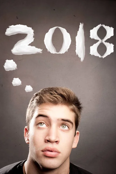 Young Man Thinking New Year 2018 His Head — Stock Photo, Image