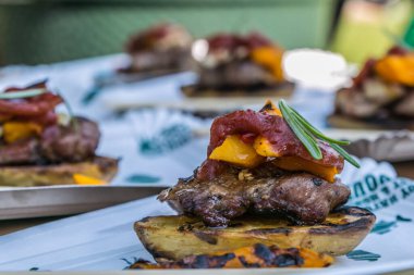 Sandwich hamburger with and mix of vegetables. Fast food. Delicious hamburger