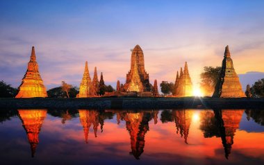 Reflection of pagoda and old temple in Ayutthaya ancient city pa clipart