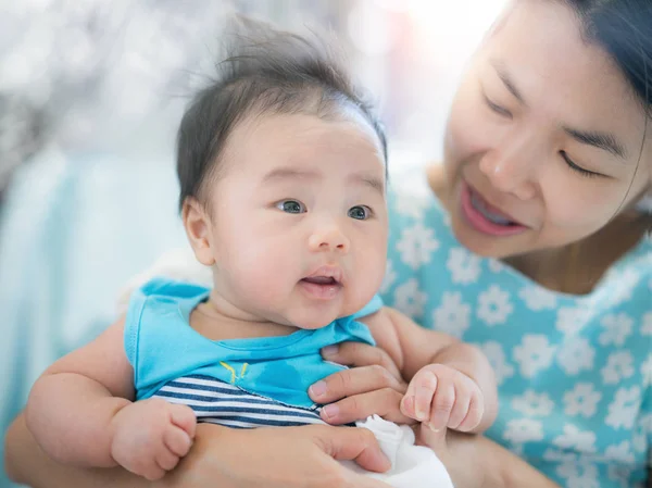 Asian baby and mom