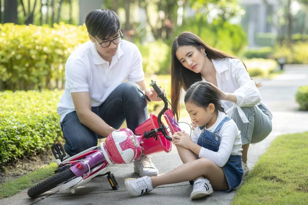 Daughter attempt to play a bicycle and got an acciden