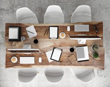 mock up poster on meeting conference table with office accessories and laptop computers, hipster interior background clipart