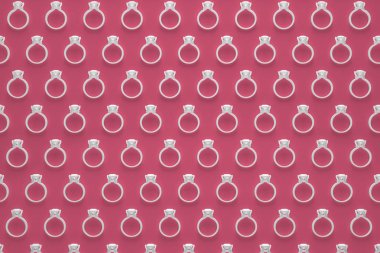 Nişan yüzüklerini desen 3d Render kırmızı zemin üzerine beyaz renkte