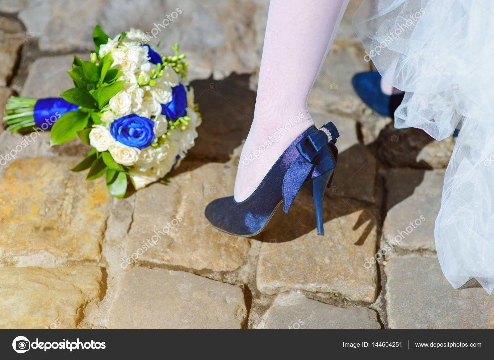 white and blue wedding shoes
