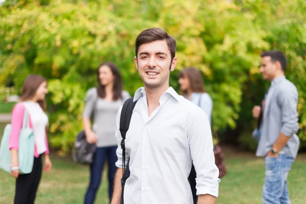 Smiling student outdoor — Stock Photo, Image