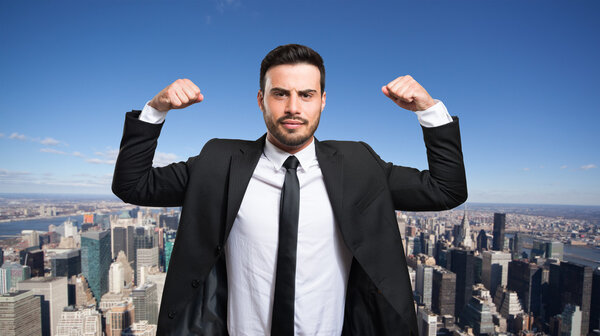 businessman raising his arms