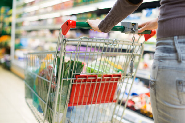 woman driving her shopping cart 