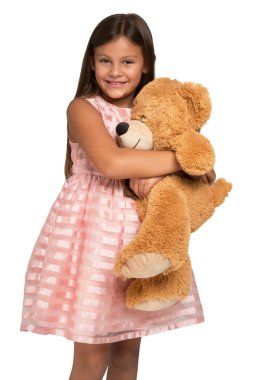 Oyuncak ayı tutan küçük kız