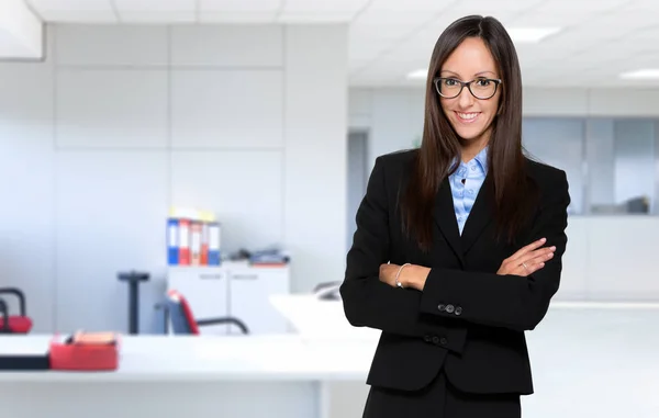 Young businesswoman in office — Stock Photo, Image