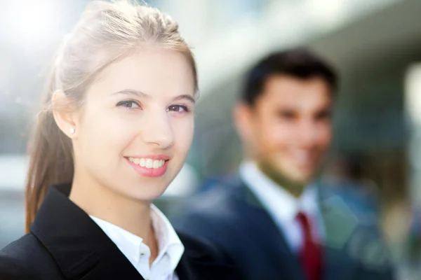 Business people smiling — Stock Photo, Image