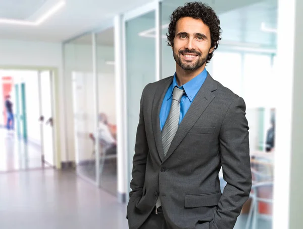 Handsome businessman in office — Stock Photo, Image