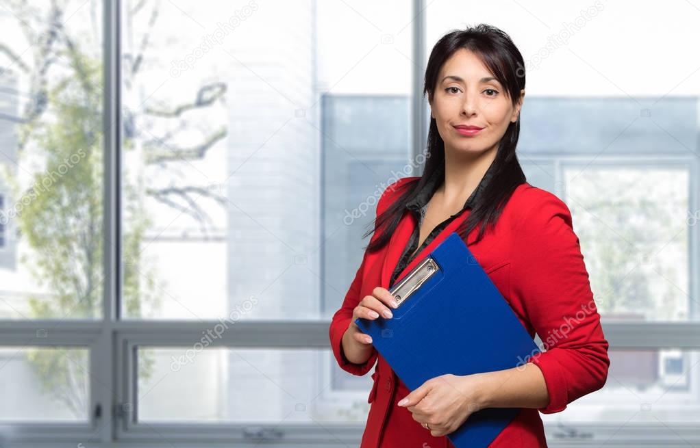 Charming businesswoman in office 