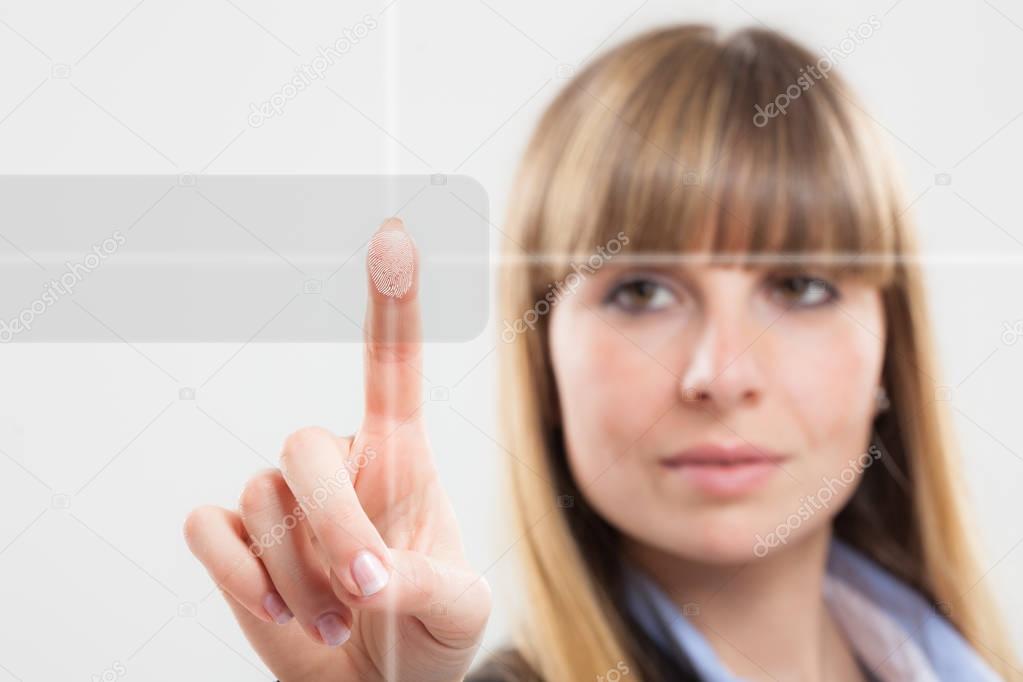 Woman using her fingerprint