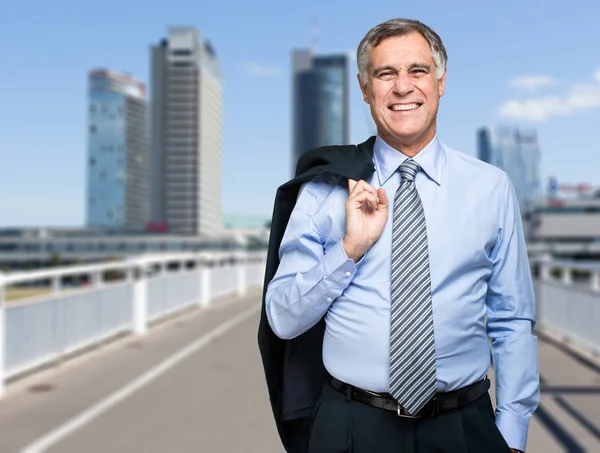 Senior businessman in modern city — Stock Photo, Image