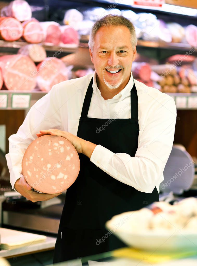 Shopkeeper working in grocery store