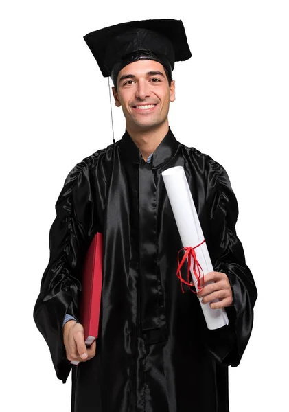 Homem graduado sorrindo — Fotografia de Stock