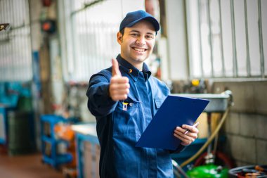mechanic showing thumbs up clipart