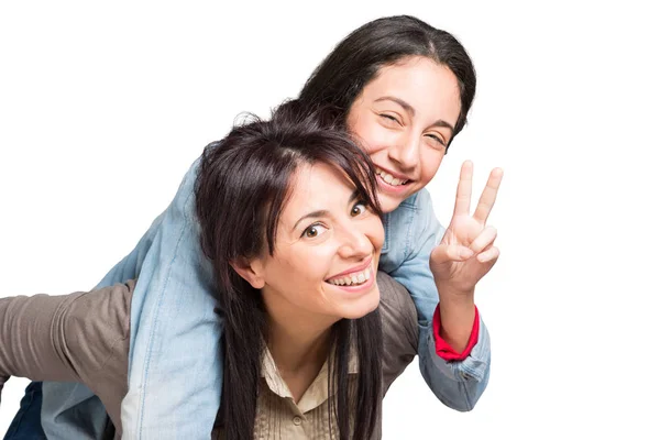 Mother and daughter showing victory sign — Stock Photo, Image