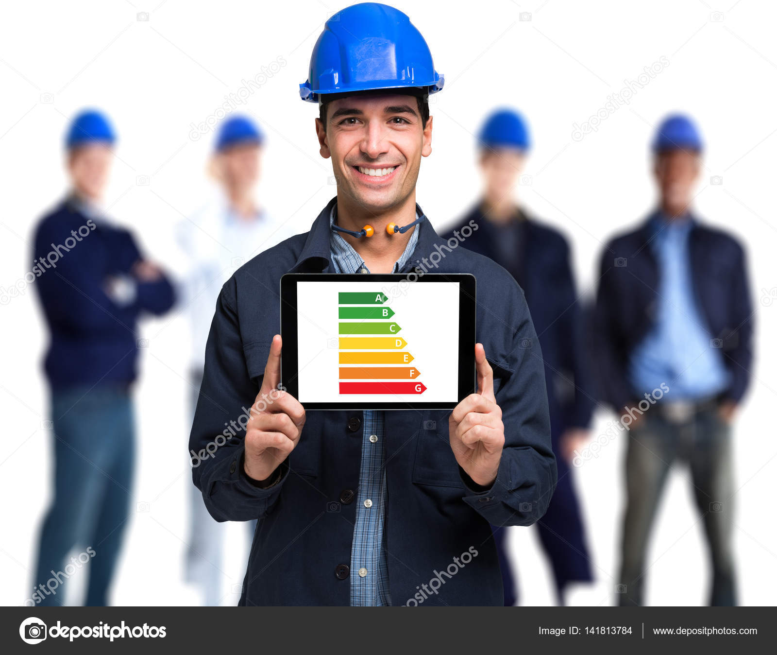 Engineer showing power efficiency rating scale Stock Photo by ...
