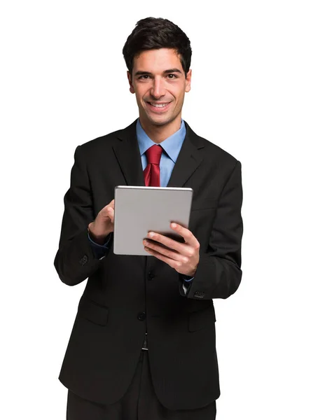 Uomo d'affari sorridente utilizzando tablet — Foto Stock