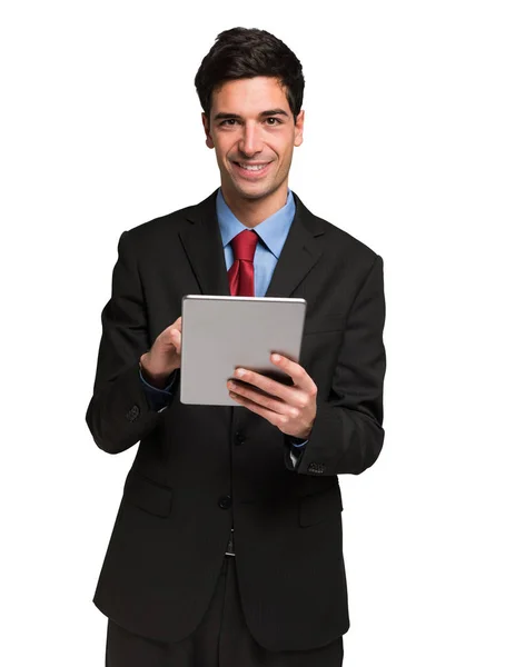 Empresário sorrindo usando tablet — Fotografia de Stock