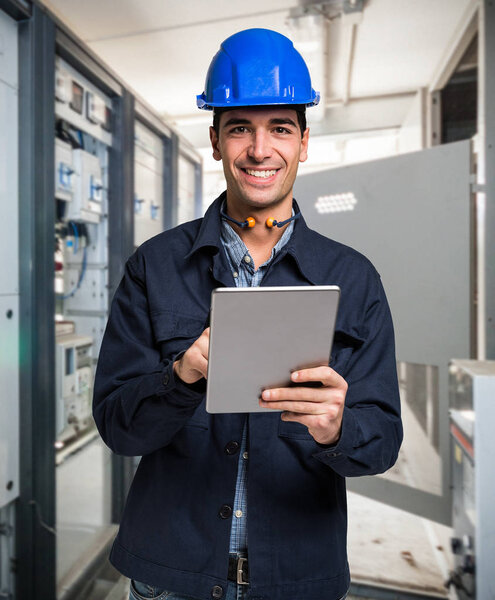 Electrician using a tablet