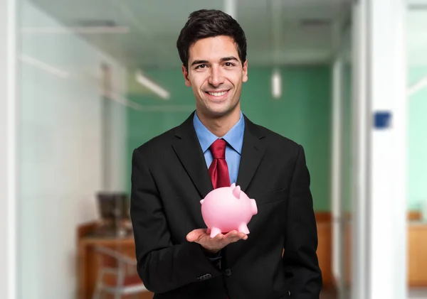 Empresário Segurando Piggy Bank — Fotografia de Stock