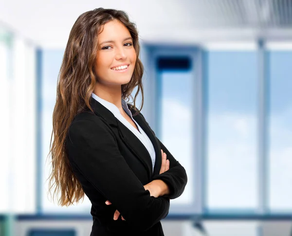 Businesswoman smiling in office — Stock Photo, Image