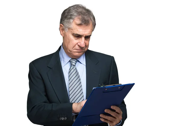 Knappe zakenman lezen van documenten — Stockfoto